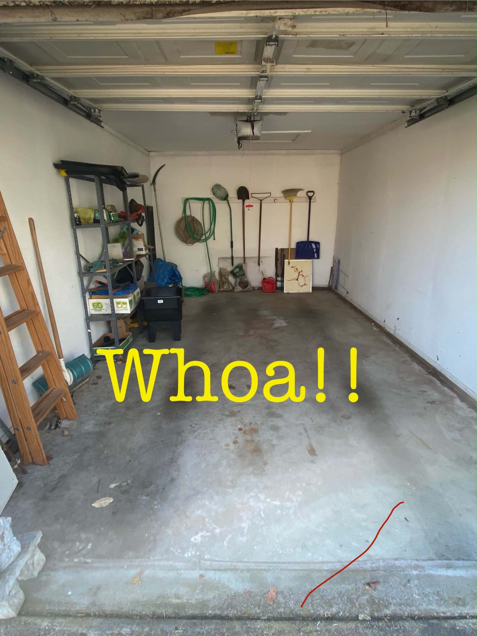 Garage after unwanted items were removed and the floor was cleared